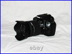 Canon EOS 100D 18.0 MP Digital SLR Camera with EF-S 18-55mm IS STM Lens