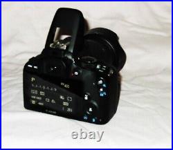 Canon EOS 100D 18.0 MP Digital SLR Camera with EF-S 18-55mm IS STM Lens
